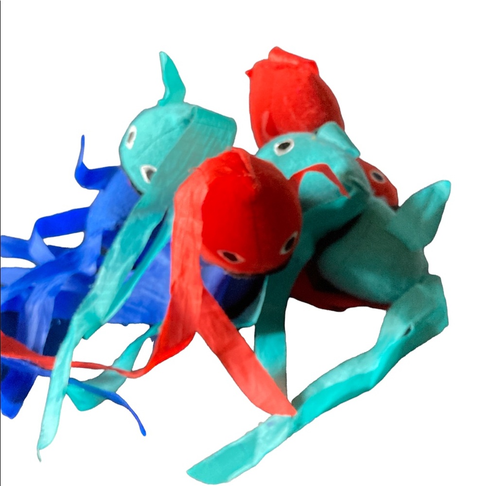 Kids toy (like a dart board but the darts are fish